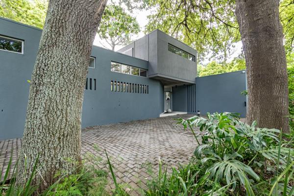 Nestled amidst mature trees and lush greenery—ideal for nature enthusiasts, this well designed home offers an open-plan spacious kitchen boasting abundant storage, including a walk-in pantry, and seamlessly flows into a ...