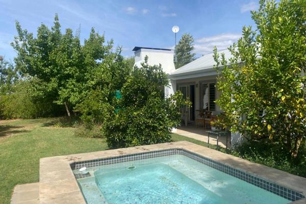 SOLE &amp; EXCLUSIVE to PAM GOLDING PROPERTIES:
A lovely cottage tucked away in the ...