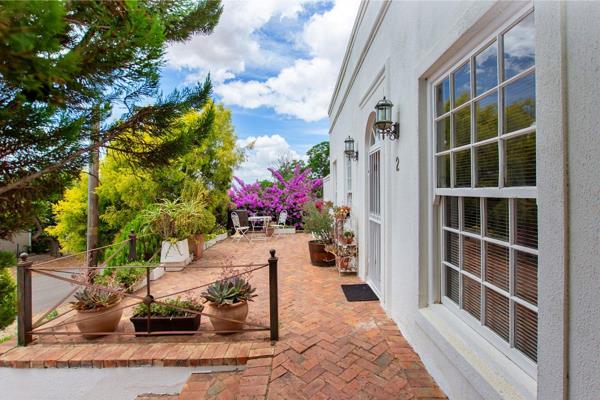 Discover this charming Colonial-style home, offering 4 bedrooms and 3 bathrooms ...