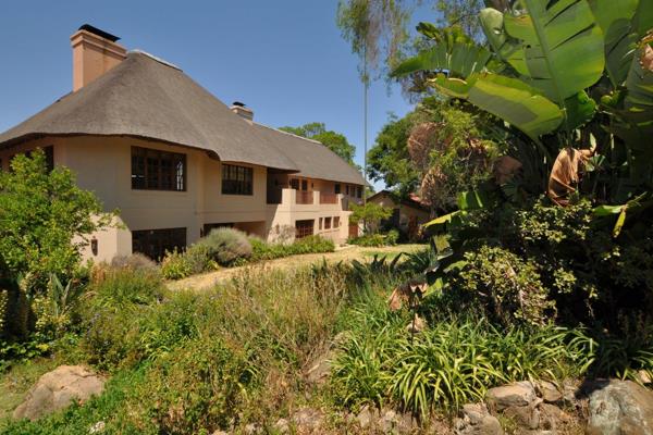 This home is thoughtfully designed with the distinctive allure of a luxurious African lodge.  This residence combines comfortable ...