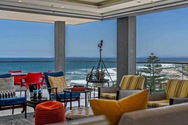 This spacious two-bedroom penthouse offers comfortable living spread across two levels, with direct lift access and expansive sea ...