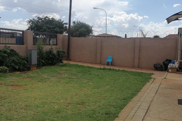 This charming property located on a main road in Lenasia has two newly built homes on one property.
Main house
Open plan lounge ...