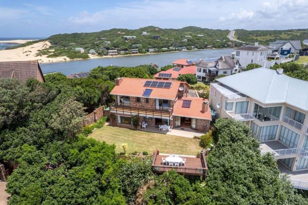 Located on the Kleinemonde Island, this low maintenance facebrick home presents ...