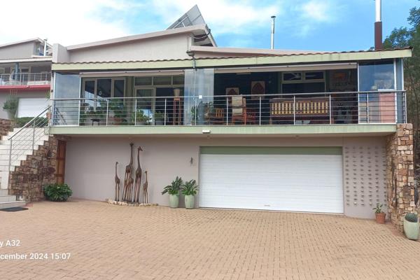 This beautiful two storey off grid, 2-bedroom house, overlooking the Bronkhorstspruit dam, offers secure country living for a small ...