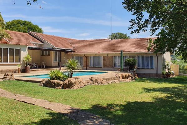 his spacious and well-maintained family home, located at Breaunanda, Krugersdorp, is perfectly set on a generous plot of land with ...