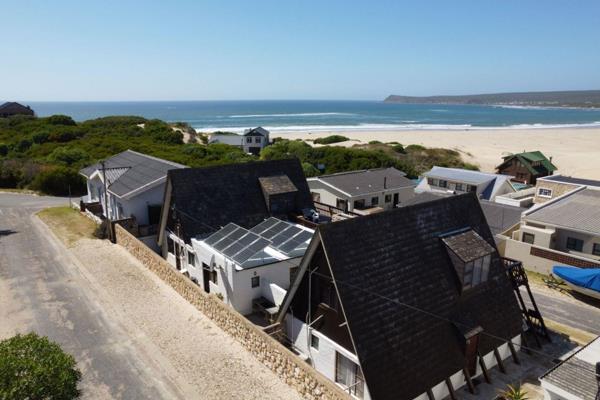 Dreaming of coastal living? This enchanting A-frame holiday home, ideally situated just ...