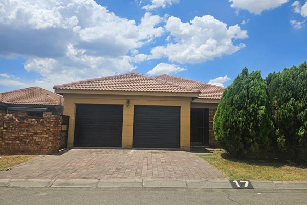 3 bedroom cluster with 2 bathrooms, open plan lounge and kitchen, double garage in a secure complex. 24 hour security pool in complex.