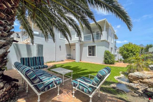 This charming 4-bedroom family holiday home is located in the peaceful Scott Estate in Hout Bay, offering a perfect blend of comfort ...