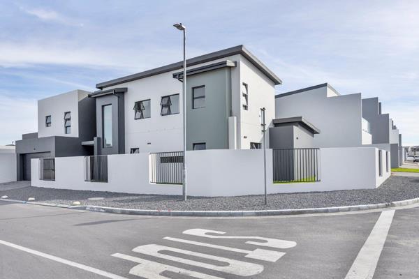 The grand entrance with a double-volume staircase leads to the second floor, setting the tone for the modern lifestyle within.

The ...