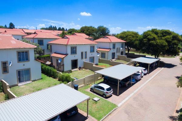 Enter through the slider/security gate into a tiled lounge area. Open-plan kitchen with granite tops, solid hob, under counter oven ...