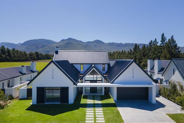 Nestled within the serene Val de Vie Estate, this stunning property offers a perfect ...