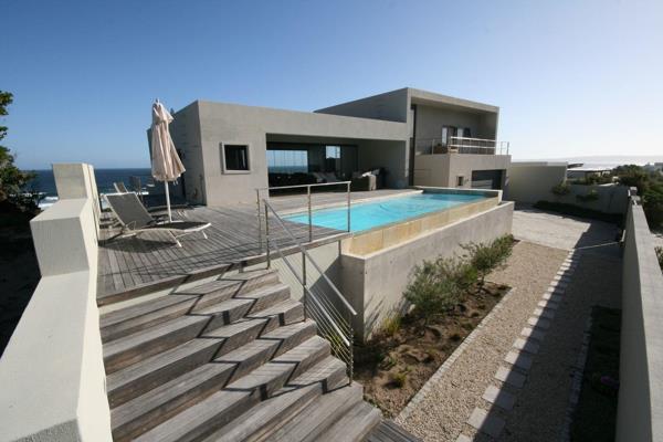 MANDATE

This modern, contemporary home is situated on the beach in Keurboomstrand. 
Generous doors of glass and windows invite the ...