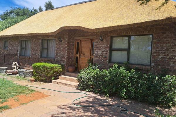 This Modern, comfortable and convenient thatched roof house are the perfect family home! ...