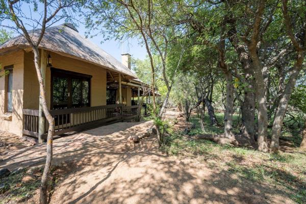 Nestled amidst the tranquil beauty of the bushveld, this enchanting 2-bedroom ...