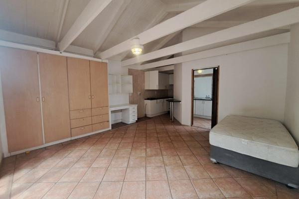 Spacious garden flat with ensuite bathroom and built in cupboards and kitchenette. 
The bathroom has a bath, basin and toilet.
A ...