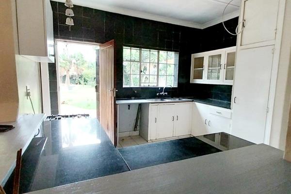 Lovely kitchen with granite tops . The kitchen has plenty cupboards and space for appliances.  Gas stove for quick easy cooking and a ...