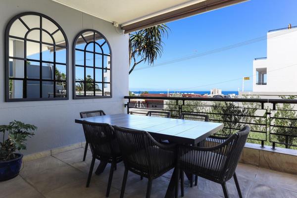 Located high up in Sea Point with ocean perspectives, this rare offering boasts ...