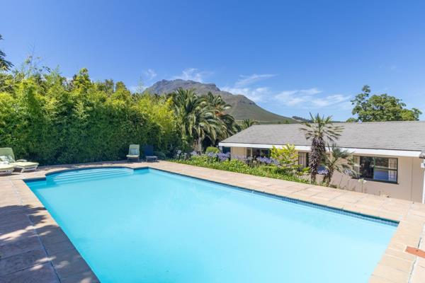 Exclusive Sole Mandate
Located in a tree-lined cul de sac within walking distance to Stellenbosch University and the breathtaking ...