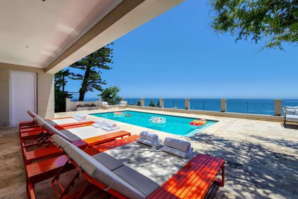 Imagine waking up to uninterrupted panoramic views of the Atlantic Ocean, stepping onto your private patio to lounge by the pool, a ...