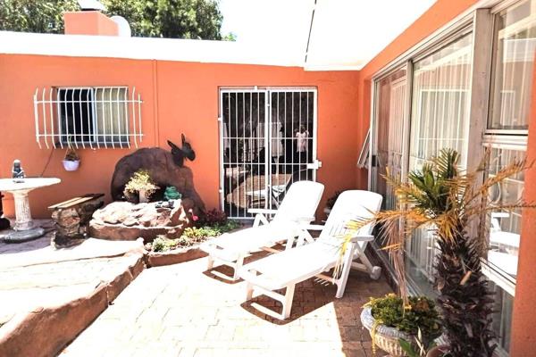 This spacious three-bedroom family home, perfect for a large or extended family, is conveniently located near the popular Bellville ...