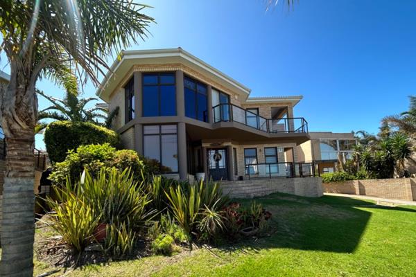 This double-story family home offers the perfect blend of comfort, style, and breathtaking ocean views.

The ground floor features ...