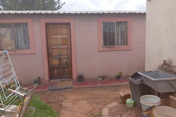 2 bedrooms lounge kitchen and outside toilet.wall fence  And 1 outside room