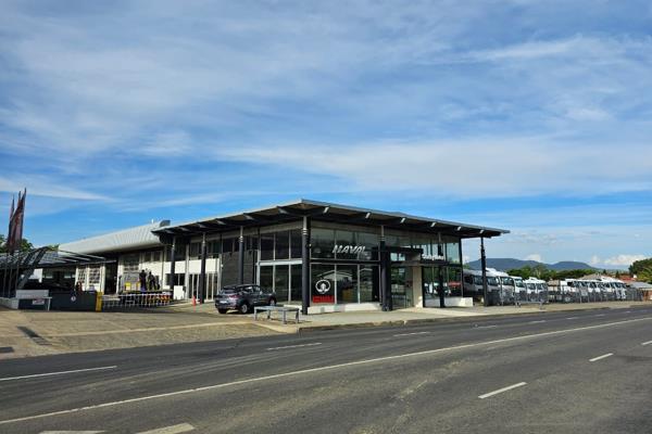 Vacated Mercedes Benz Dealership.
Located on intersection of two main roads in ...