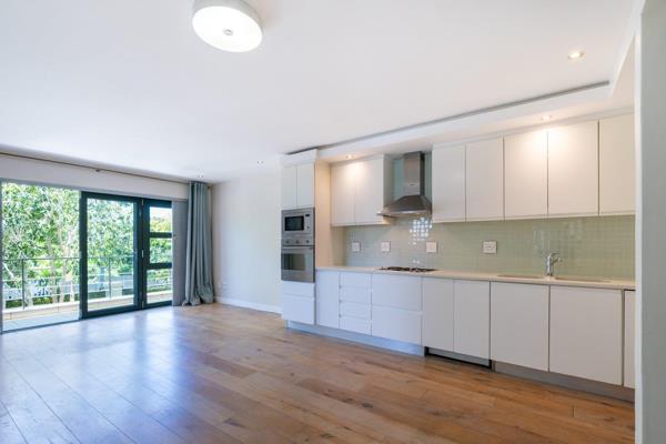 Step into this upmarket 85m2 apartment featuring a bright, north-facing patio and ...