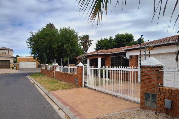 Discover this stunning three-bedroom, two-bathroom family home located in the sought-after suburb of Parklands, Cape Town. Set on a ...