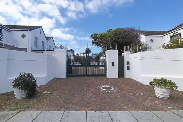 Spacious four-bedroom home, tucked away in a small secure estate in Wynberg with only 8 ...