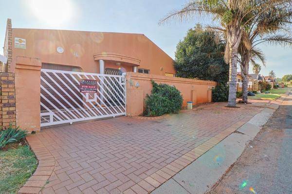 Nestled in the highly sought-after, boomed-off area of Lenasia South Ext 1, this ...