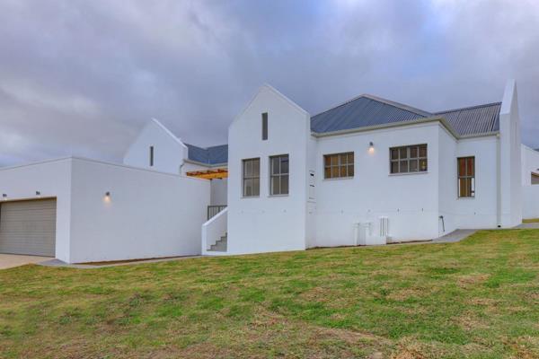 Nestled at the foot of the majestic Outeniqua Mountains, this distinguished Cape Vernacular estate presents an exceptional opportunity ...