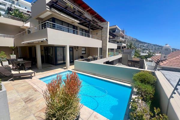 Situated high up in Sea Point is this modern, super spacious triple volume 231m2 apartment(interior)400m2 plus including outdoor living ...