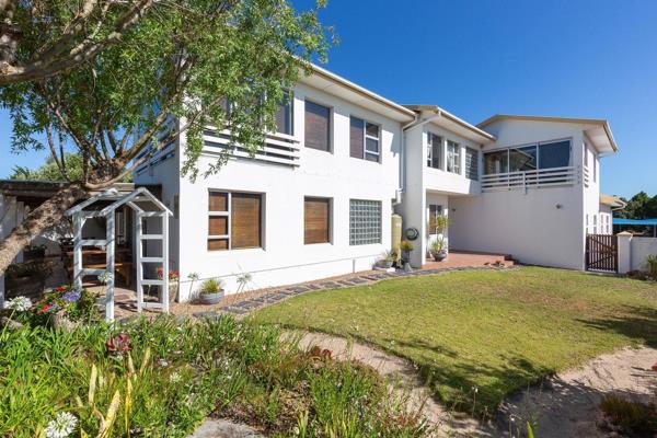 This Magnificent house is situated in a quiet cul-de-sac bordering Langebaan Country ...