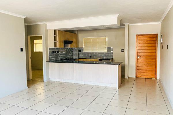 Open plan flow from kitchen, dining and lounge make this lovely unit warm and inviting. Lounge leads onto a small balcony. Unfurnished ...