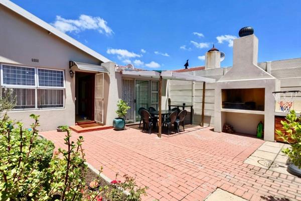 Lovely low maintenance home with a private garden with an undercover patio and a tranquil ambiance. 
On entering this neat ...