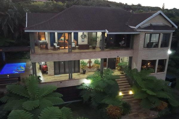 Discover this exquisite upmarket mansion, a true hidden gem that exceeds all expectations. Nestled in a serene and exclusive location in an eco-estate located between Woodgrange-on-Sea and Umzumbe on the KZN Southcoast, this architectural masterpiece combines timeless ...