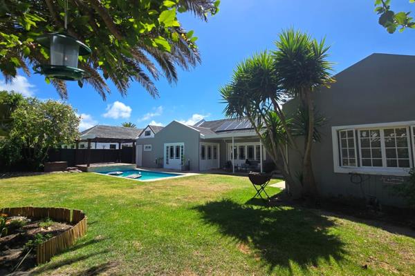 Located in sought-after Constantia Vines is this gem of a home.  It is located at the end of a quiet street (popular for kids to ride ...