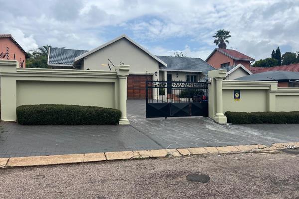 As you enter the property there is  spacious yard that can accomodate close to  eight cars .
It has the following security ,   and ...