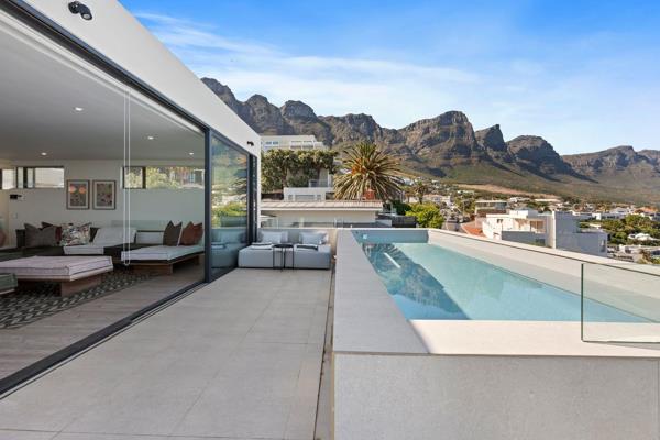 Experience the ultimate Cape Town getaway in this stunning Camps Bay holiday villa ...