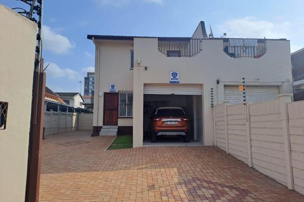 Main bedroom with balcony and stunning views. Modern kitchen and spacious living areas. Secure property with electric gate and fence, 1 ...