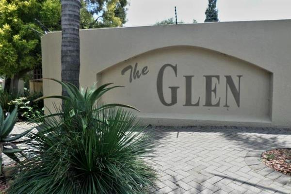 This beautiful two-bedroom, two-bath townhouse in the Glen is a pristine, upscale, and ...