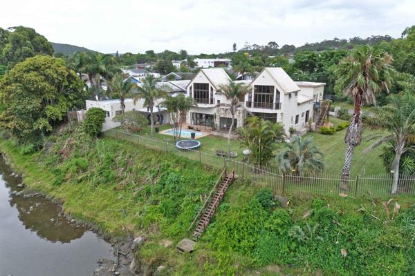 This exceptional property is nestled on the banks of the picturesque Nahoon River, offering a tranquil lifestyle with breathtaking ...