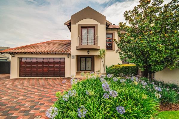 Welcome to your dream family home! This captivating residence is a stunning oasis bathed ...