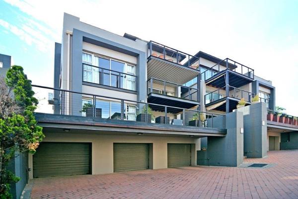 2-Bed, 2-Bath Lower level apartment in very exclusive Lock-Up-and-Go complex with wonderful views across to Sandton. Open-plan modern ...