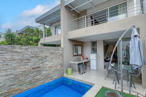 Open-plan living area with a well-appointed kitchen and breakfast bar. Ample space for a dining and lounge accompanied by a covered ...