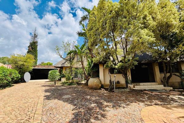 This charming, double-story thatched roof home is a tranquil retreat perfect for those who appreciate nature and serenity. Boasting a ...