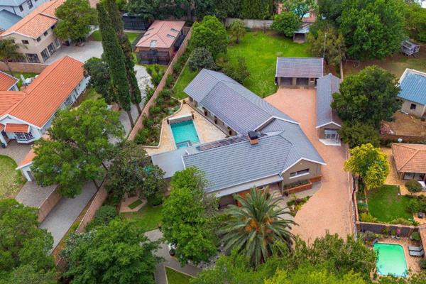 This breathtaking property, located in the highly sought-after Rynfield Estates in Benoni, redefines luxury living with its impeccable ...