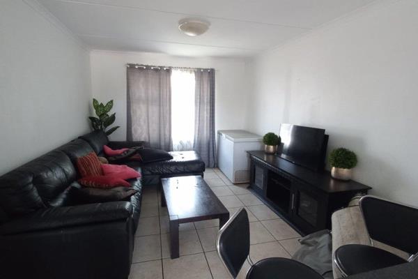 Spacious Apartment with lock up Garage and extra parking bay in Strand located in ...