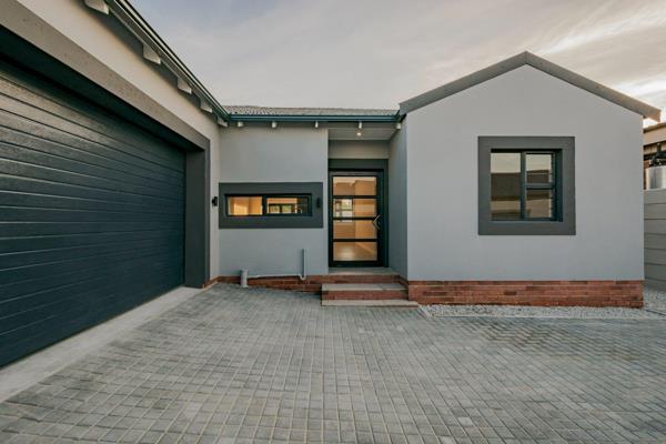 This modern home offers 3 bedrooms with built-in cupboards and 3 bathrooms, two of which ...